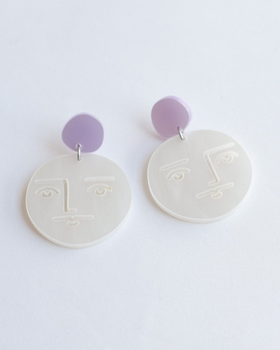 Pendientes cara blancos y morado