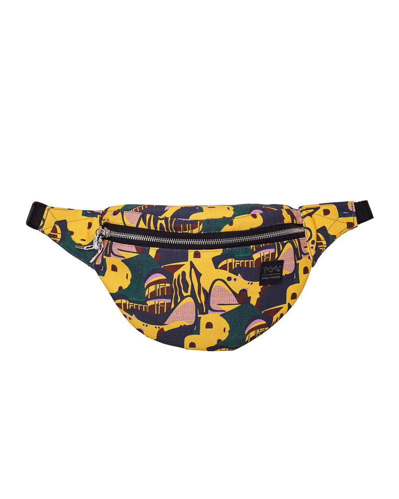 bolso-riñonera Terremoto con cierre delantero, cinta regulable, estampado original destacando colores tierras y amarillo, moda lentita, moda española, marca unisex