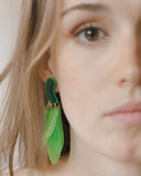 MRLASPIUR-JINNIA, aros color verde, diseño colorido, materiales reciclados, accesorios multifuncionales,
diseños divertidos