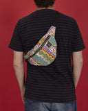 bolso-riñonera cocoliche con cierre delantero, cinta regulable, estampado original de flores colorido, moda lentita, moda española, marca unisex