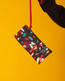 Funda de gafas o móvil con estampado original hecha de tejidos de botellas recicladas, estampado Lux, diseño original luces difuminadas de colores sobre fondo negro, moda sostenible
