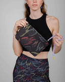 Bolsín neceser Brava x peSeta neceser llamas de colores, bolso de maquillaje, estampado original con llamas en colores sobre fondo negro. moda sostenible, hecho en España, producción local