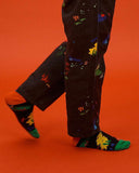 Calcetines negros peSeta & Capitán Denim-calcetines-peSeta-[denim]-[estampado]-[sostenible]-peSeta
color azul, verde, rojo y amarillo, estampado colorido con distintas formas