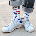 Calcetines Pete Florentini - peSeta, diseño colorido azul rojo y amarillo en fondo blanco, producción local, moda responsable